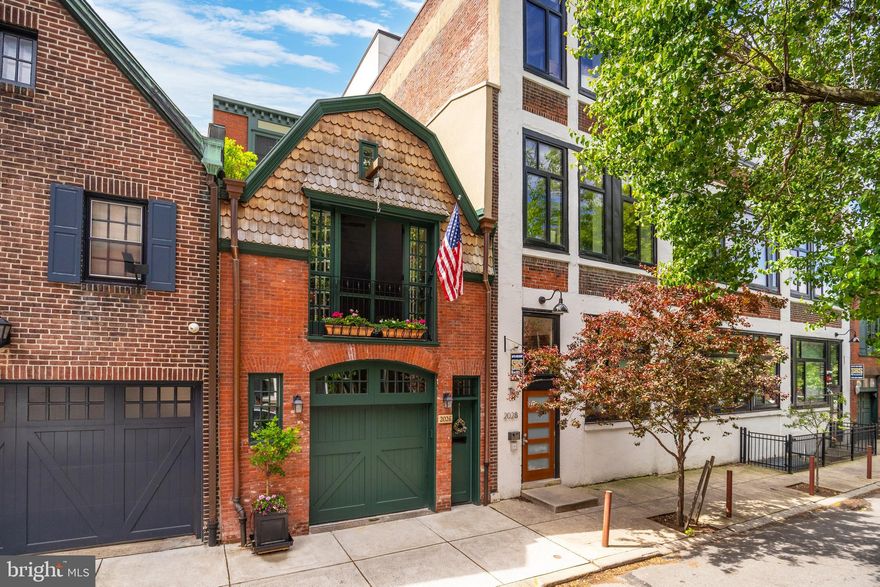 Introducing 2026 Rittenhouse Square Street, a meticulously restored carriage house situated on a quiet tree-lined street just one block from Rittenhouse Square Park. This exquisite 4-level townhouse offers an impressive 3600+ square foot interior, with a stunning facade set back from the street. Featuring 4 bedrooms, 3.5 bathrooms, an attached 2 car garage, a private terrace, and an elevator servicing all levels. Rarely offered, this beautiful 80-foot-deep property boasts tremendous curb appeal showcasing forest green roofing, classic mahogany details and hemlock fir garage doors.

Parking becomes a pleasure at this home, with a 2-car garage featuring porcelain tile flooring, custom sliding barn doors, storage, and electric charging capabilities.  Adjacent to the garage is a first level guest suite  perfect for guests, a gym, or office. Heated porcelain floors, a full bathroom and private outdoor space complete this floor.  Second level of this impeccable 4-story townhouse features solid oak floors, soaring ceilings and oversized double-glazed windows that stream in natural light throughout; creating a warm and inviting ambiance across the 80-foot-deep lot. The living and dining areas are open, spacious, and perfect for both large social gatherings and intimate day-to-day living. The living room is adorned with vaulted ceilings, skylights, a gas fireplace and a picture-perfect Juliet balcony overlooking Rittenhouse Square Street. Completing the second floor is a half bath, coat closet, and a chef’s kitchen with granite countertops, elegant cabinetry, a wine cooler, full pantry and a separate breakfast nook to enjoy your culinary creations.

The third floor is entirely dedicated to the luxurious primary suite, which includes an incredible private terrace set back from the street with panoramic city views. The spacious yet cozy primary bedroom offers two sizable walk-in closets and a bathroom with heated Carrara marble floors, a large glass shower, soaking tub, double vanity, and a linen closet.

Natural light radiates from the fourth floor skylight below to the two bedrooms on this level, each with ample storage space and a shared full bathroom.

This magnificent property has everything you need for a comfortable and luxurious lifestyle, a perfect blend of original details and modern upgrades. Best of all, there are still 5 years remaining on the tax abatement.

Located in the Greenfield School District, this home is just one block from Rittenhouse Square park, close to Schuylkill River Park, UPENN and many world-class restaurants and cafes. You'll love the fabulous location and the perfect blend of elegance and comfort that 2026 Rittenhouse Square Provides. Schedule a tour to see this hidden gem.  See video tour.