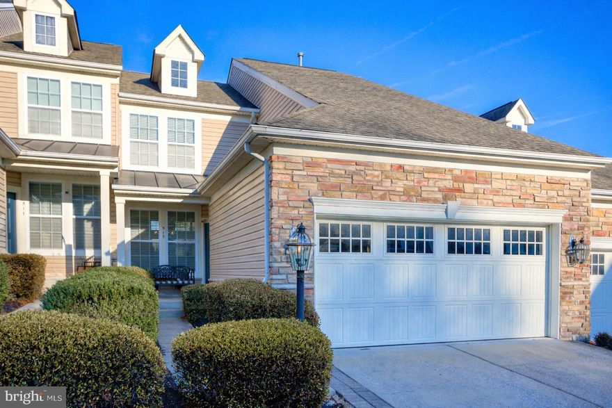 Welcome to this beautifully maintained interior villa in the highly desirable gated community of Bulle Rock in historic Havre de Grace, Maryland. Backing to the Bulle Rock Golf Course driving range, this home offers comfort, convenience, and exceptional amenities. The main level features a primary bedroom suite and an inviting living room with refinished hardwood floors, vaulted ceiling, and gas fireplace. Upstairs, enjoy a versatile layout with a loft, full bath, second bedroom, and a bonus room perfect as a third bedroom or office.
The finished basement provides abundant space for multiple entertaining zones (including a theater room with the included projector and screen), along with a full bath and ample storage and utility areas. In Bulle Rock, lawn care, snow removal, and trash service are all included. Residents also enjoy access to a 37,000 sq. ft. clubhouse with indoor/outdoor pools, tennis and pickleball courts, a full gym, and more. Experience low-maintenance, resort-style living—welcome home!