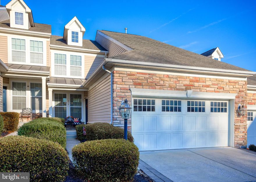 Welcome to this beautifully maintained interior villa in the highly desirable gated community of Bulle Rock in historic Havre de Grace, Maryland. Backing to the Bulle Rock Golf Course driving range, this home offers comfort, convenience, and exceptional amenities. The main level features a primary bedroom suite and an inviting living room with refinished hardwood floors, vaulted ceiling, and gas fireplace. Upstairs, enjoy a versatile layout with a loft, full bath, second bedroom, and a bonus room perfect as a third bedroom or office.
The finished basement provides abundant space for multiple entertaining zones (including a theater room with the included projector and screen), along with a full bath and ample storage and utility areas. In Bulle Rock, lawn care, snow removal, and trash service are all included. Residents also enjoy access to a 37,000 sq. ft. clubhouse with indoor/outdoor pools, tennis and pickleball courts, a full gym, and more. Experience low-maintenance, resort-style living—welcome home!