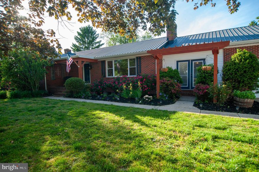 Be the first to tour this beautiful brick ranch in the country setting of Canterbury located at 191 Irish Hill Road.  Three Bedroom, 2 Bath Home with Stunning Kitchen Cabinets, Brand New Appliances, a separate wall oven, and a center island for added cooking space.  Adjoining the kitchen is a spacious dining room, and a bonus brick breezeway which you can close off from the kitchen.  This room features opening to the front of the home, back of the home and also access to the over-sized 2 Car Garage, with lots of storage space.
In the family/living room you can enjoy a brick wood-burning fireplace to take the chill off  or as an added heat source when the weather gets cooler.  This home boasts original hard wood floors and a full sized basement with added laundry including another fireplace and a bonus bar area.  This space can easily be finished off to entertain friends and loved ones.