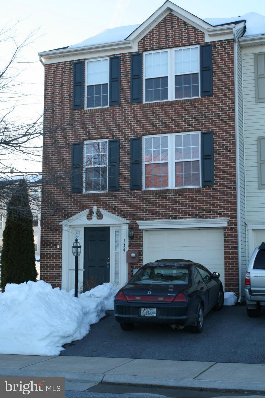 Incredible 3 story, END unit townhouse in desired Fairfax Crossing. Home features 3 bedroom, 2 full bath and 2 half bath's, Corian counters, hard wood floors throughout main level level. All appliances convey including washer & dryer. Newer 80 gallon hot water heater and water softener. Potential short sale being negotiated by the Law Office of Michael Briel. Call for a showing.