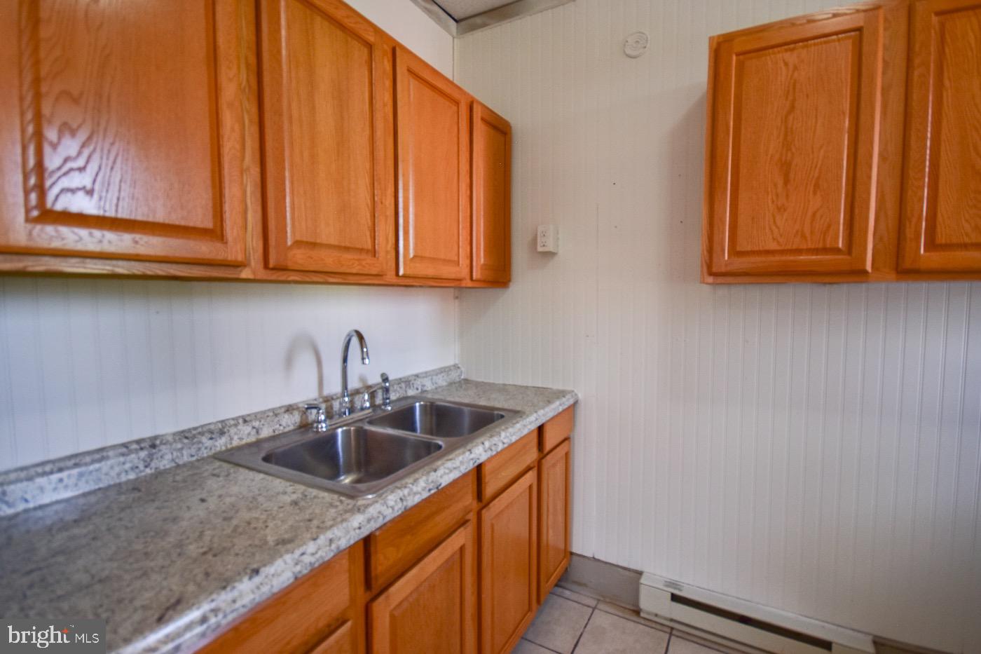 Tenant has the option to pay $1200/month rent with water, sewer, trash and electric up to $150/month included. At the $995/month rent the tenant will be responsible for 1/6 of the monthly cost of water, sewer, trash and all of the electric cost. A unique opportunity to move into a nice downtown apartment at an all inclusive price. Rent includes electricity ($125.00 cap), water, sewer and trash. Floored with LVP, this cool place includes granite countertops and ceramic floors in the kitchen and baths.
