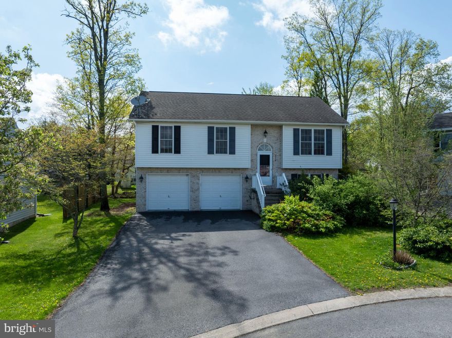 Terrific split entry home with covered back deck, 2 car garage and backs to neighborhood path. Situated at the end of a cut de sac and close to a neighborhood park.
Open main floor living and dining area with lots of natural light. Large kitchen. 
3 bedrooms with primary and a shared hall bath. Lower level features a family room or office, work space. Laundry located here. Large 2 car garage has door to yard. Nice shed in the back. 

Property being sold "as is".
Water and sewer are shut off.