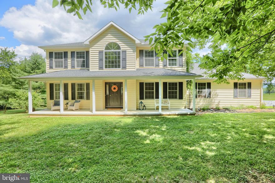 PICTURESQUE, PEACEFUL AND PRIVATE SETTING ON 2.7 ACRES IN MONROE TOWNSHIP, CUMBERLAND VALLEY SCHOOL DISTRICT. WITH WINTER VIEWS OF SKI ROUNDTOP. FEATURING A BRIGHT, OPEN FLOOR PLAN WITH NEUTRAL D COR, LONG FRONT PORCH, ATTRACTIVE HARDWOOD FLOORS, NEW WALL TO WALL CARPETING. LOVELY KITCHEN WITH ABUNDANT CUSTOM CABINETRY, BREAKFAST BAR, PANTRY, GRANITE COUNTERS ACCENTED WITH TUMBLED MARBLE, SEPARATE BREAKFAST AREA WITH BAY WINDOW. FAMILY ROOM HAS PATIO DOOR TO LARGE DECK, READING NOOK OR SMALL OFFICE, LARGE MASTER BEDROOM SUITE. FINISHED WALK-OUT LOWER LEVEL FEATURES LARGE GAME ROOM, FULL BATH, POSSIBLE 5TH BEDROOM OR OFFICE. OVERSIZED SIDE ENTRY GARAGE WITH WOODBURNING OR COAL STOVE CONNECTED TO AIR DUCTS SUPPLEMENTING HEAT. SEPARATE 26X21 WORKSHOP BUILDING HAS ELECTRIC AND HOOKUP FOR WATER. SURROUNDED BY SCENIC FARMLAND WITH A VIEW OF THE SOUTH BLUE MOUNTAIN, WILDLIFE VIEWS. NO DEVELOPMENT ACROSS THE STREET  APPALACHIAN TRAIL 200 YARDS AWAY. HISTORY BUFFS WILL LOVE THE CIVIL WAR ERA STONE WALL FRAMING THE PROPERTY. CLOSE PROXIMITY TO THE TARGET SHOPPING AREA,THE TURNPIKE, RT. 15, CARLISLE PIKE MAKE THIS PROPERTY THE PERFECT CHOICE ! A PLEASURE TO SHOW!