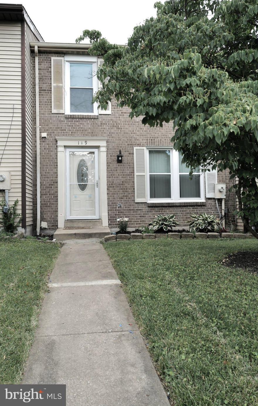 ANOTHER HUGE PRICE REDUCTION.  Seller wants to sell!!!!  Best of Queen Ann Village in Owings Mills.  Year-end close out sale.  Motivated sellers.  Home has a great layout.  A little TLC will make the inside warm and comfy.  Paint and flooring change the look from a townhouse to a beautiful home.  Brick front 1820 square foot townhome with 2-bedrooms and 3.5 baths.  Home has an open concept with large living room, picture front window,  powder room on 1st level, updated white Kitchen/ Dining combo, newer stainless-steel appliances, island, granite counter tops, ceramic and vinyl floors on main level, grey Trex decking with white railings, two full baths on the upper level, owners suite with dressing area, walk in closets, lower level with a full bath and walk out from the family room.  Home is move in good condition and move in ready. CALL SHOWING TIME SERVICES FOR AN APPOINTMENT.