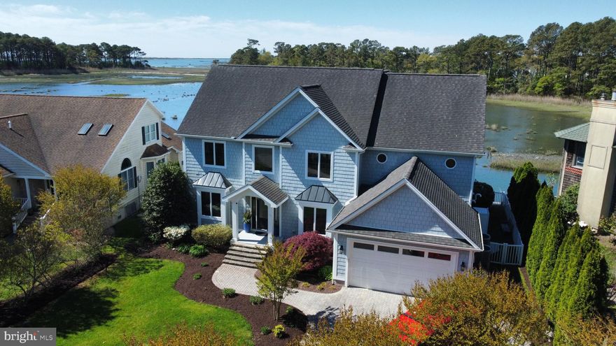 Live the ultimate coastal lifestyle in this 5BR, 4.5BA custom bayfront retreat in coveted West Ocean City with NO HOA!! With unobstructed open water views, a private dock  and over 4,300 sq ft of beautifully designed space, this home is packed with smart upgrades and luxury finishes.
Features include a vaulted great room with powered blinds, multi-zone heated tile floors, chef’s kitchen, and main-level primary suite. Enjoy high-tech touches like WiFi-enabled thermostats, dock lighting, and ventilation, plus a Tesla charger, Blink cameras, and invisible in-wall speakers.
Relax under the remote-controlled awning, take in the ocean view from your crow’s nest balcony, or retreat to the “secret” bonus room. Extensive storage, whole-yard irrigation, uplighting, and pre-wired generator backup complete this dream home.