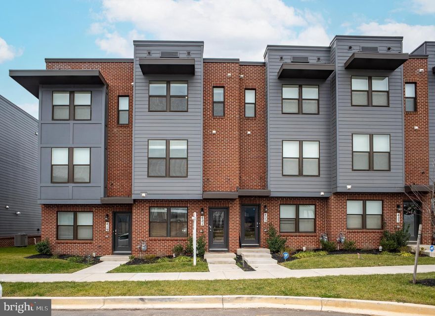 Welcome to this stunning upgraded 4-bedroom, 4-(FULL)bath Townhome. 

**Located in Renn Quarter, one of the hottest master planned communities in the City of Frederick, the home is uniquely surrounded by open space and views, away from the crowded rows area. The coming soon community amenities include clubhouse, pool and riverwalk along Carroll Creek connecting to the heart of downtown Frederick. 

**The urban style Carlton model offers a unique floor plan with FOUR bedrooms and EACH of those suited with its own bathroom. *The entry level bedroom provides convenience - easy fit for an office or guest room, connecting with the rear-end garage. Adorned with LVP flooring, the main level boasts living space with natural lights, accessed with a big deck, and along with an upgraded kitchen with quartz countertop and stainless steel appliances. At the end of the living area, there is the 2nd bedroom and a full bathroom accessed from the common area as well. The upper level has two spacious bedrooms and laundry. The master bedroom suite includes a big walk-in closet.