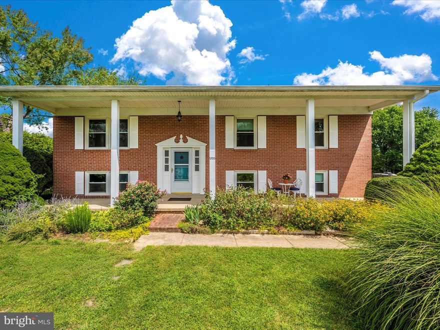 Welcome to your new home at 5720 Shookstown Rd. This meticulously maintained brick split foyer has a roof less than 2 years old and sits on just over 3/4 of an acre.  No HOA and No City Taxes. Even before you walk inside, you'll appreciate the expansive covered front patio.
The main level features real hardwood floors that look like they were just installed yesterday.  Both the eat in kitchen and the living room have built-in shelving that's not only super functional but also a stylish way to display your favorite collectibles. From the kitchen, you have direct access outside to the very spacious deck with steps down to the patio that extends the length of the house. Want to stay out of the sun? That's fine. A portion of the back patio is covered. 
All 3 bedrooms are of a generous size and the same can be said of the main level bathroom. The lower level in no way feels like a basement because this split foyer allows for larger sized windows and in turn an incredible amount of natural light. In fact, when you pull in the driveway, you can walk right around the corner and access the home through the back door or the slider without having to navigate any steps. It's a perfect set up for a possible in-law suite. This level feels massive and plenty of space for different zones of living and includes the other sizable full bath.  Want to create a bedroom? Maybe put in a kitchen? There's still plenty of room left over for a family room with the fireplace (with a wood stove insert) as the focal point. The home sits back and the driveway is wide enough to accommodate 2 cars side by side and at least 4 cars deep. The level backyard is deep, backs to trees, and there's an electrical line (not currently live) run underground that once was hooked up to an existing outbuilding that has been recently removed. The home is totally move in ready.