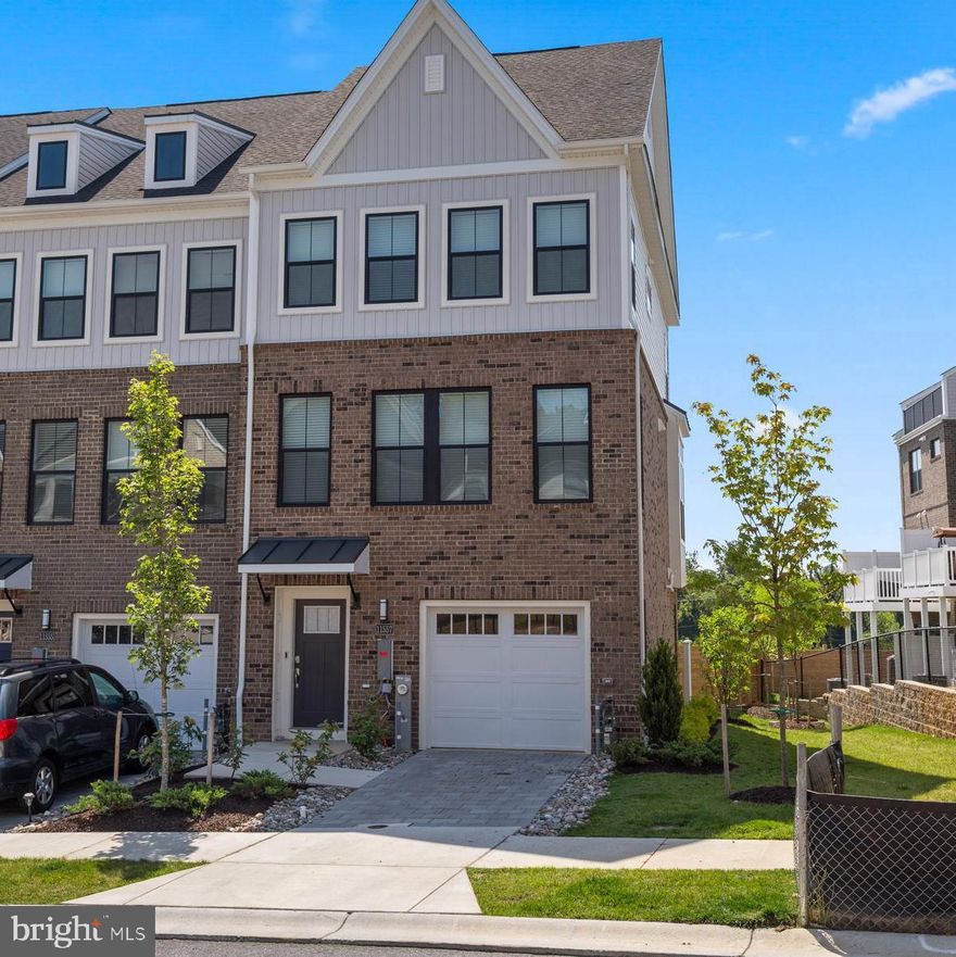 Beautiful Chapelgate Townhome: 4 levels of versatile space. 3 BR/3 Full Baths and 2 Half Baths.  First floor rec room with full bath. Second Level features a gorgeous kitchen with quartz countertops, fabulous oversized island, stainless steel appliances including a 5-burner gas cooktop. This gourmet Kitchen opens to the dining room and family room. There is a convenient deck for relaxing and grilling too. Upstairs features laundry area, two bedrooms, and a full tiled hall bath plus a private owner's suite with a full bath with double vanity and spacious shower. The fourth level includes a half bath and rooftop deck and features a wonderful recreation space that can be used for a family room or home office.  There is a one-car garage with room for storage too. Super location near Turf Valley with easy acess to I-70, Route 29, Baltimore and Washington DC. Immaculate and Move in Ready!!