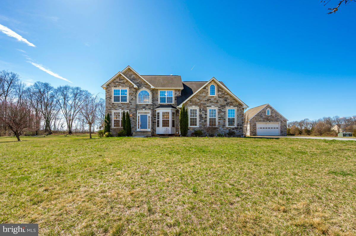 OPEN HOUSE CANCELLED DUE TO SELLER ACCEPTING CONTRACT. This well-maintained home sits on over 5 acres and offers 5 spacious bedrooms, 3.5 bathrooms, and over 4,300 sq. ft. of comfortable living space. The open concept kitchen features maple cabinetry, a large island, connecting to a bright family room with a stone fireplace and pellet stove . The main level includes a formal dining room, inviting living room, private office, and a convenient half bathroom. Upstairs, the primary suite boasts a cozy sitting area, spa-like bathroom with a soaking tub, and a walk-in shower, along with three additional bedrooms, full bathroom, and designated laudry room. The finished lower level is designed for entertaining, complete with upgraded living areas, a large bedroom, full bathroom and a walk up exit leading to a large concrete patio. Step outside to take in the gorgeous private views from the spacious Trex deck and charming gazebo—perfect for relaxing or entertaining. Just minutes from Charles Town and major commuter routes, this home offers the perfect combination of peaceful privacy and easy access to shopping, dining, and entertainment. Don’t miss your chance to make this incredible property your own—schedule a showing today!