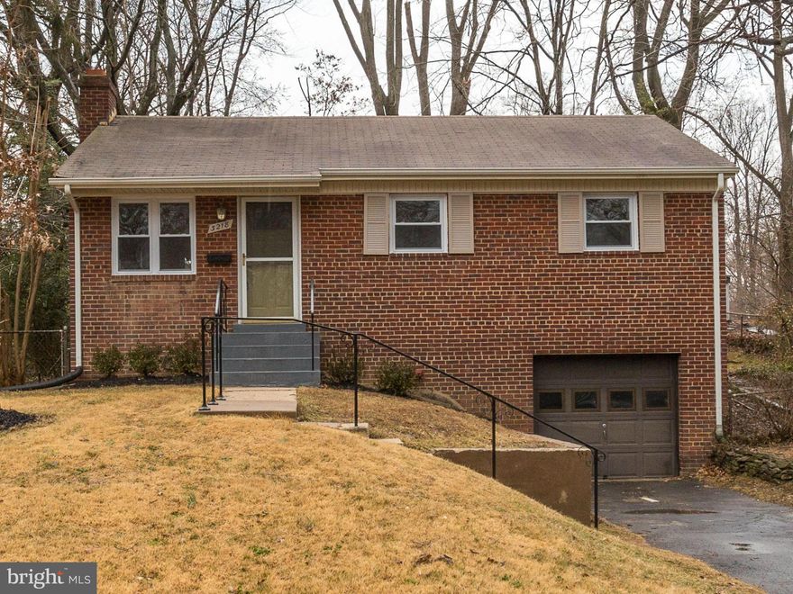 Completely remodeled kitchen with all new appliances, brand new windows, attached garage, plus 4-season sunroom. Immaculate condition, just professionally painted, spectacular hardwood floors just refinished.  Fenced in back yard on almost 1/4 acre. Lots of storage both on Lwr Lvl & attic. Located 1 mile or less from 495, Giant, and Route 50. 7/10 mile to Metrobus 1A, 1B, & 1Z. Nearby parks.