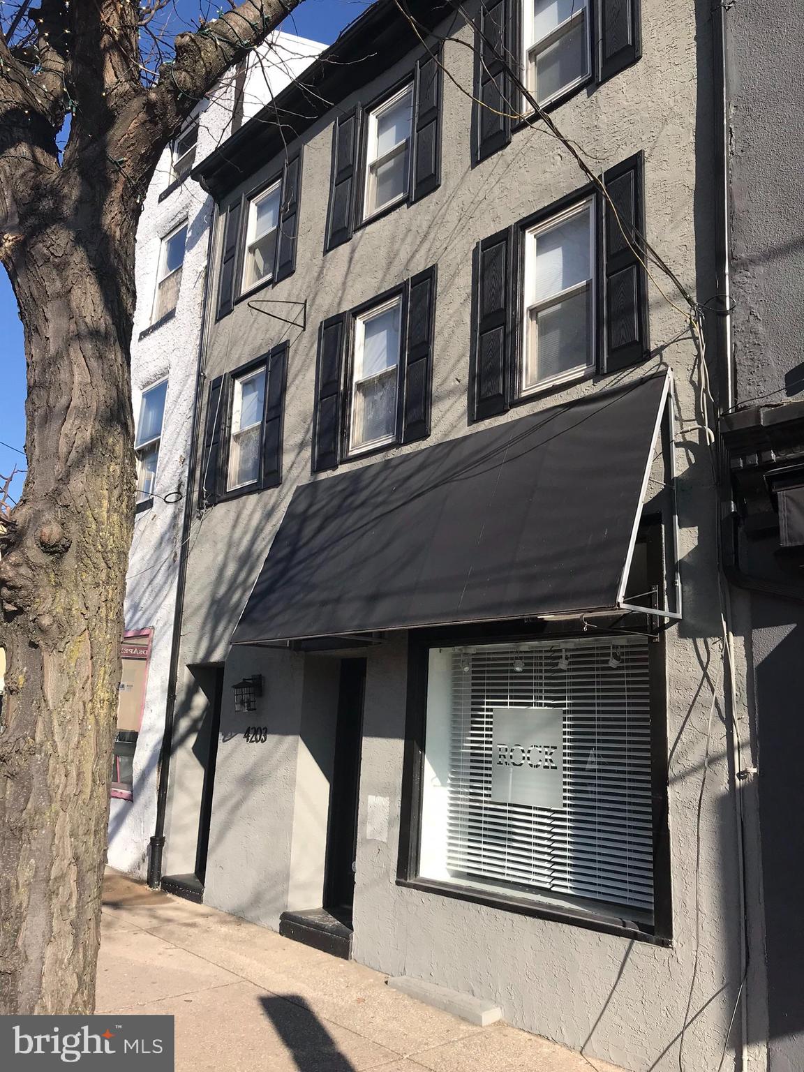 MIXED-USE Opportunity on Main St. The most desirable location in Manayunk! Ideal investment opportunity- perfect for investor or owner occupant, live in one unit and have the other unit help pay down your mortgage! Zoned CMX 2.5 which qualifies for AirBnB use! This building is a rare, extra wide (21 feet) & has been fully renovated and well maintained. The Residential unit is bright, spacious with high ceilings. This bi-level unit has 3 bedrooms & 1.5 baths. 1st LEVEL: features a huge Living Room/Dining Room flooded with natural light, Hardwood floors throughout, huge Kitchen with granite counters, stainless steel appliances, 40 inch espresso stained cabinets, tile backsplash; tiled half bath with stackable washer & dryer and coat closet. 2nd LEVEL: 3 Bedrooms with copious closet space and fully tiled bath with shower. Separately metered with central air system & in unit hot water heaer. The Commercial Unit is currently rented and the unit features hardwood floors, a half bath, basement storage, access to the rear yard and has is separately metered with central air and its own hot water heater. All utilities paid by the tenants (Gas, Electric & Water) Zoned CMX 2.5 which qualifies for AirBnB use! Close to I-76, Kelly drive, Schuylkill, the Main Line & 13 minutes from Center City, Philadelphia! Walk Score of 91, a Walker's Paradise! Nearby public transit and bike able, near Manayunk River Trails, Wissahickon/Fairmount Parks!