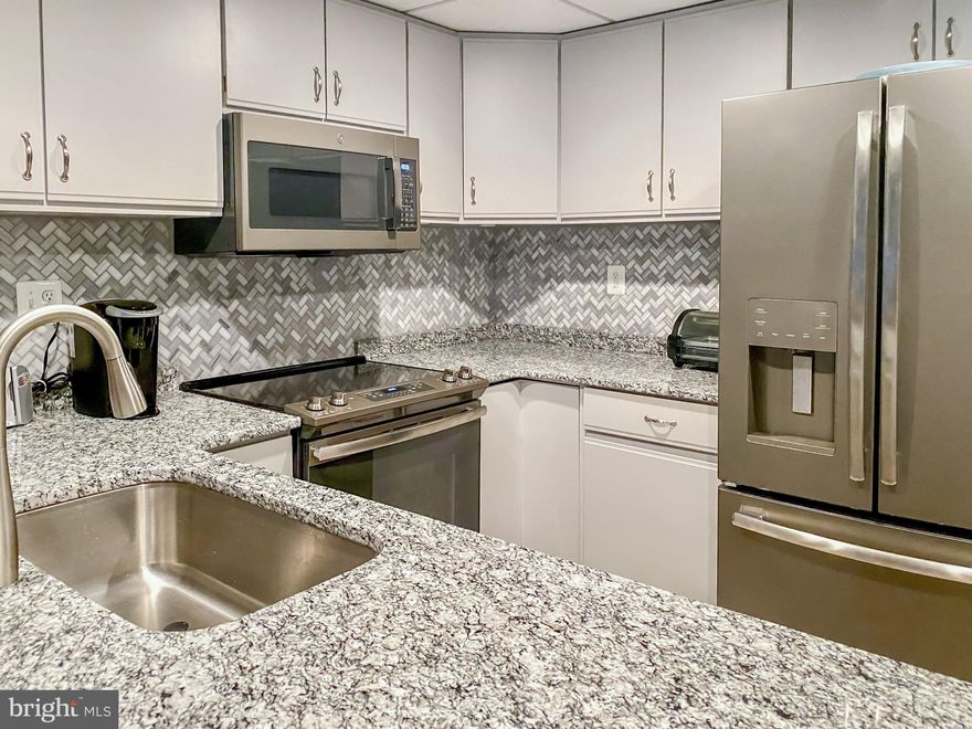 Completely remodeled in 2019!  Situated on 143rd street in desirable North Ocean City, this beautiful 2nd floor ocean-view has everything you'd hoped for and more. Let's run down the list of amazing updates this beach-home has completed:  New graphite-stainless-steel appliances, custom tiled kitchen backsplash, upgraded lighting fixtures throughout, newer hvac, newer water heater, new flooring throughout, fully updated bathrooms (with glass enclosure doors), new 2-panel doors, and so much more!   Let's not forget the additional features this great condo association provides: Ocean-views, easy beach access, PRIVATE POOL, ELEVATOR, STORAGE LOCKER, LOW CONDO FEES, NORTH OC LOCATION, and plenty of PARKING, close proximity to movies, restaurants, mini-golf, shopping and so much more!  Silver Sun is an exceptional building (and Association) with proactive management, and strong financials. If you're looking for your new beach place, look no further. You'll want to move quickly, as this one is bound to sell fast!