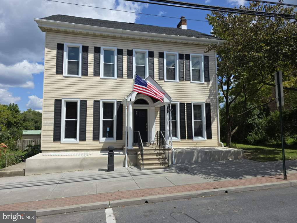 Convereted 8 unit right on Main St in Alburtis. Main home features 6 residential units and 1 commercial office space while carriage house consists of a 2 bedroom, 1 bath house that has yet to be updated. There is ample parking in the rear of the building, and street parking for any overflow. This home was converted into units and everything has been done inside the main building, while the Carriage House gives an opportunity to raise rents after rehab. This is a class A building with great tenants.