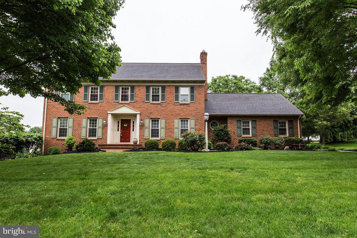 Stunning Mission Hills all-brick Colonial features Geothermal heating and cooling system, 4 bedrooms, hardwood floors, granite kitchen with stainless steel appliances and large island, finished basement with bar and entertainment space. Gorgeous sunroom leads to entertainment-sized deck and private rear yard. Newer roof, downspouts, and gutters. Beautiful and quiet tree-lined street and neighborhood.