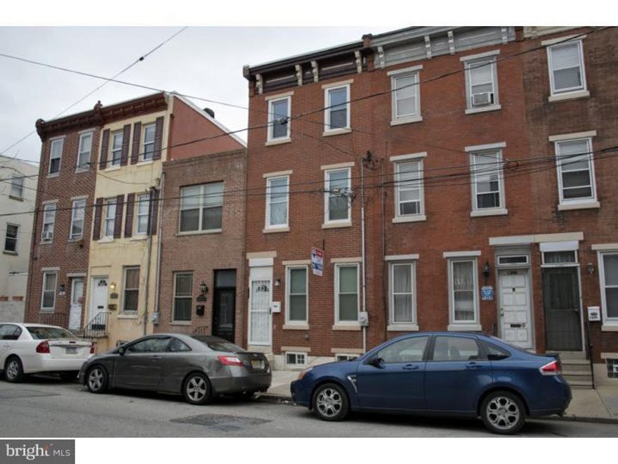 This 3 story, 3 bedroom, 3 bath, finished basement, and large yard is so close to Northern Liberties that you can walk to the Piazza and Liberty Walk. This spacious brick front row offers many desired features.  Hardwood throughout, central air, and renovated throughout. The 1st floor has an open floor plan,  with Living Room, formal Dining Room, an eat-in-Kitchen with plenty of cabinets & a beautiful granite counter. The 2nd floor has spacious bedrooms each with shared hall bath. The 3rd floor has a large Master Bedroom Suite with private bath. Full size finished basement level offers a 3rd full bath, and laundry hook ups ready for your washer and dryer. Conveniently located near shopping, restaurants, SEPTA, and minutes from Center City.