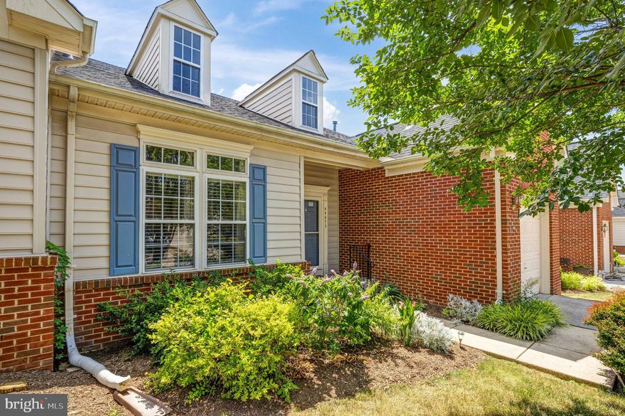 Welcome Home!  55+ Active Adult Community!  Ashburn Village amenities! Main level living!  Full view glass storm door and lots of windows allow for natural light in this bright and airy home.   On the main level you are greeted with a spacious foyer with coat closet, grand living room and dining room with soaring ceilings and hardwood floors.  An eat-in kitchen with Corian countertops, stainless steel appliances, an oversized double undermount sink, and pantry.  You'll love the convenience of the large mud-room/laundry room with front loading newer LG washer and dryer and access to your one car garage.   The primary suite has wall to wall carpeting, a walk in closet, and spacious ensuite bath with LVP flooring,  a jetted tub, dual sinks and separate shower.  A guest powder room is also on the main level.   Upstairs you will find a loft area and 2 large secondary bedrooms, crown molding, a full bath with dual sinks and LVP flooring, and tons of storage space.  Lower level has a large open rec room with an egress window, wall to wall carpeting, half bath with rough in for a full, and more storage space.  Enjoy al-fresco dining on your maintenance free deck off of your eat-in kitchen as well as a paver patio and fenced in rear yard.  Close proximity to all that Ashburn has to offer, including One Loudoun, W&OD trail, medical facilities, award winning INOVA Loudoun Hospital, Ashburn Senior Center, Potomac Green Park, Whole Foods, and much more
RECENT UPDATES: Hot water heater 2023, W/D 2023, Roof 2021, Dish washer 2021, A/C 2019,