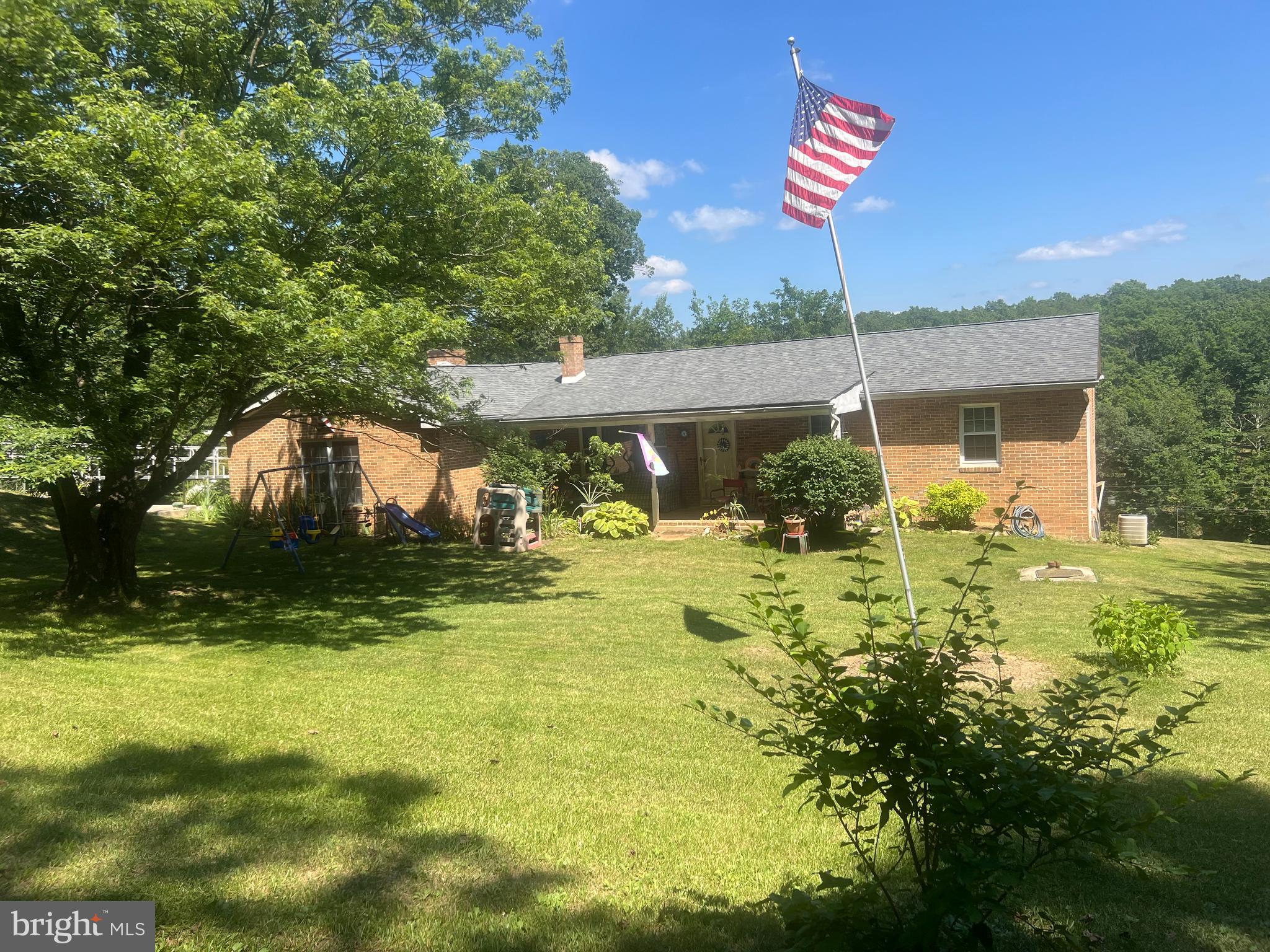 What a great find ! All brick single-level 4 bedroom/2 bath 2000 sq ft home on 1.5 UNRESTRICTED acres with easy access off a hardcap rd! This home really has a lot to offer with 4 new windows, new insulation, a long handicap ramp, a 24 x 32 workshop, 5 sheds, a kennel, open and wooded property and a great location! In addition owners will be conveying 2 refrigerators, stove, 2 washers, dishwasher , and dryer. Single-level living at it's finest so come out check this one out first ! Great location too with easy access to Romney and Cumberland ,MD as well so come check this one out first and live free in the Wild, Wonderful, West Virginia !