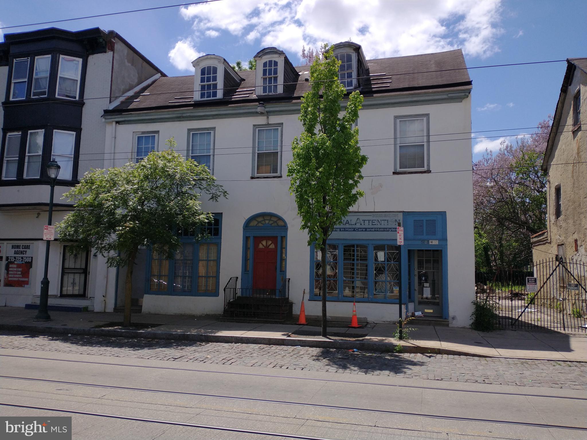 Attention all developers! A CMX2.5 property in the heart of Germantown has become available for purchase. This historical property, while needing updating and repair, sits on a sufficently large lot to permit up to 9 dwelling units natively (with an additional 2-6 units possible if mixed income and green roof zoning bonuses are applied and approved) along with commercial rental along the first floor front of the building. Property also comes with easement to utilize the driveway @ 5110 Germantown. Close to shopping, mass transit (both bus and Wayne Junction SEPTA).