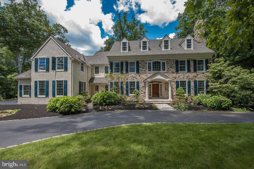 Welcome to 37 Harrison Drive, located at the sought-after Harrison Estate, at a GREAT NEW PRICE!   This classic home captivates all those who visit with timeless appointments. The grand front-to-back reception foyer welcomes you with gleaming marble floors, a multi-light chandelier, gracious staircase & Juliette balcony.  Framing the Foyer is the Celebration Ready Dining Room and spacious Living Room with fireplace and tall windows to allow the beauty of nature to create its own art!  The extended Library is privately located off the Living Room and is handsome with rich custom wood trim, bookcases and built in cabinetry. The rear Foyer opens to the Solarium with window walls and tiled floor   this is the best destination spot for a quiet cup of tea! When entering the gourmet Kitchen, you will quickly notice the beautiful custom Kountry Kraft cabinetry, elongated center island, main & prep sinks, stainless steel 48 inch Subzero refrigerator/freezer and commercial grade range with built in ovens and there is seamless transition to the breakfast nook with a triple glass door to the deck. The backdrop to the Kitchen and Nook is the Family Room with a fieldstone fireplace, wainscoting, custom built-in white cabinetry, newly beamed volume ceiling and glass rear wall feature window! A conveniently located Mudroom offers cubbies, rear staircase, access to the 2nd Powder Room, a secondary front entrance and an interior door to the 4-car Garage!  The second floor boasts a Master Bedroom suite including a sitting area, two closets and a luxurious Master Bathroom with marble tile, shower with tiled walls & ceiling, double vanity with bench area, jetted tub and separate water closet. Four additional spacious Bedrooms and 3 Full Bathrooms, along with Laundry Room and Family Area complete the second floor. The daylight Basement has glass doors to the rear yard and is unfinished. This gorgeous stone and stucco residence is situated on a beautiful sunny 1.38-acre home-site. In addition, there is a detached original Garage on the property that is perfect for the home gardener or hobby enthusiast!  Come see this value priced property today!