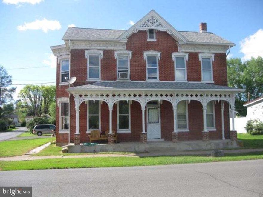 Classic brick beauty. Superb garage space for the ''toys''. Multi-faceted, multi-functional home has first floor living convenience or convert to formal dining/office. Beautiful wood trim and period accents including stage coach carriage front stepping stone! Cosmetics needed. Motivated seller says bring offers. A lot of space, unbelievable garage and commuter convenience at an affordable price.