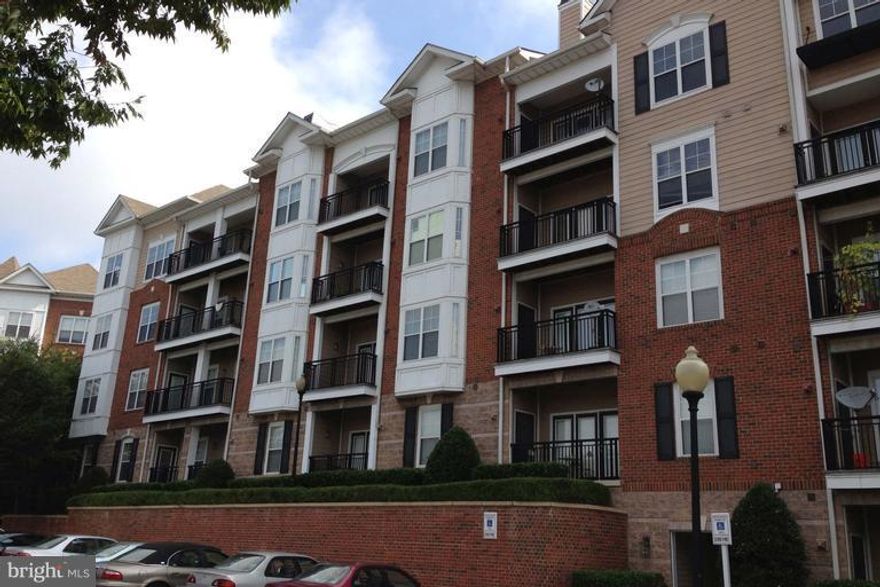 WALK TO METRO! Spacious, well-maintained condo in DOWNTOWN ROCKVILLE. Just Blocks from METRO and ROCKVILLE TOWN SQUARE with shopping, dining, and more! Unit includes HARDWOOD floors, kitchen with STAINLESS STEEL appliances, GRANITE countertops, BALCONY, and WASHER/DRYER. Tons of amenities, Pool, gym, comes with a storage unit and two covered parking spaces.
