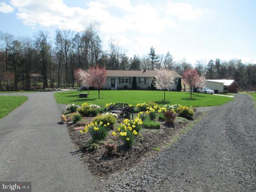 Breathtaking Landscapes greet you at this meticulously maintained 6 Bed, 3 full 4 Half Bath sanctuary. Enjoy nature with your many outdoor living areas while listening to the babbling creek and birds chirp. You can let your horses and farm animals roam in your fenced in pasture, tinker in your garage, workshop, and greenhouse and that is just outside.  Inside enjoy your 4 season room, a good book in your library or work from home in your office, plenty of space to entertain and host guests. SO MUCH MORE YOU TRULY MUST SEE TO TRULY APPRECIATE!