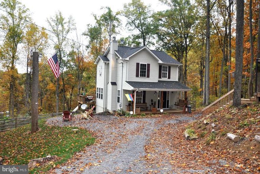 ** Beautiful Mountain Views ** This well maintained Colonial has 3 bedrooms and 2.5 baths - Hardwood floors throughout the mail level - Upgraded kitchen appliances - Large Family Room with a wood burning fireplace - Has 3 good size bedrooms on the upper level - Fully fenced backyard - Large deck perfect for entertaining your guests