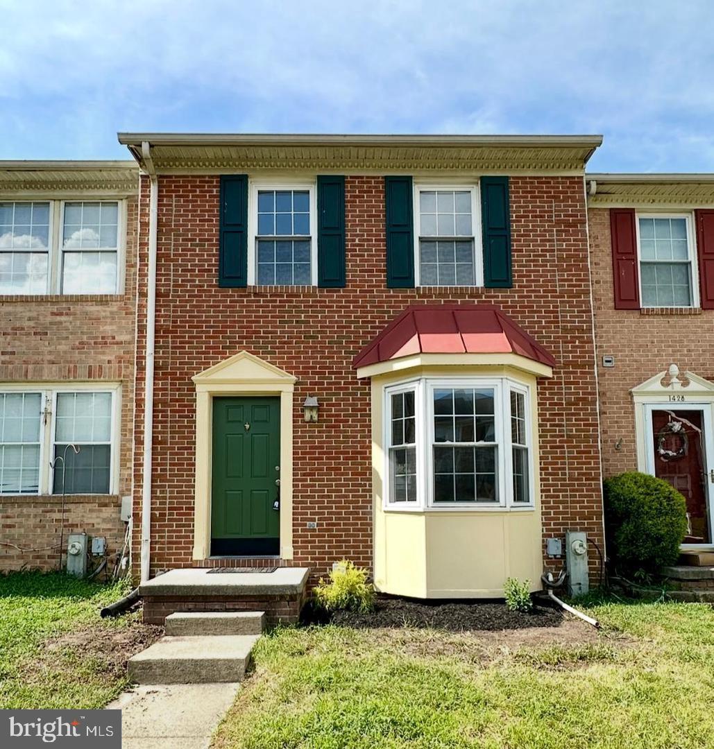 Beautifully updated 3-bedroom, 1.5-bath brick townhome for rent in a quiet Edgewood community—move-in ready! Fresh paint throughout, brand new wood flooring on the main level and finished lower level, and new carpet . Bright bay window fills the living room with natural light. Spacious kitchen features white appliances and ample cabinet space. Finished walk-out basement includes a half bath and sliding glass doors —ideal for a rec room, office, or extra living area. Washer and dryer in unit for added convenience. Water heater and HVAC replaced in 2018. Two assigned parking spaces. Convenient location near shopping, dining, schools, and major commuter routes. Clean, comfortable, and ready for you to call home!