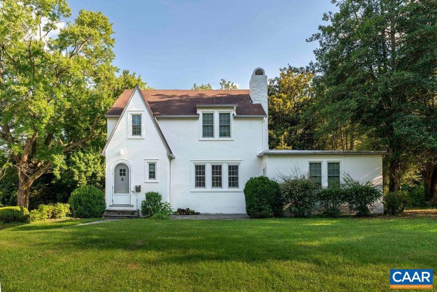 Zoned RX-3 with no density restrictions! Charming stucco cottage in an exceptional UVA-adjacent location, directly across from Runk Dining Hall and moments from Grounds, Scott Stadium, and the Hospital.  This property offers architectural character, rental opportunities, and long-term potential. With its steeply pitched roofline and arched front door, 2203 Stadium Road has undeniable curb appeal. Inside, original details create warmth and authenticity: hardwood floors, craftsman-style trim, plaster walls, built-ins, and a striking stone fireplace anchoring the main living space. Arched openings and generously sized rooms enhance the cottage charm while maintaining comfortable flow. The home offers 3 bedrooms and 2 full baths, a dedicated dining room, and light-filled living spaces. An attached, separately metered 1-bedroom, 1-bath apartment (no kitchen) provides flexibility for guests, office or studio use, or supplemental income (buyer to verify). Set on a large, level lot - a rare City find - this property offers immediate rental appeal and future possibilities under RX-3 zoning.,Formica Counter,Wood Cabinets,Fireplace in Living Room