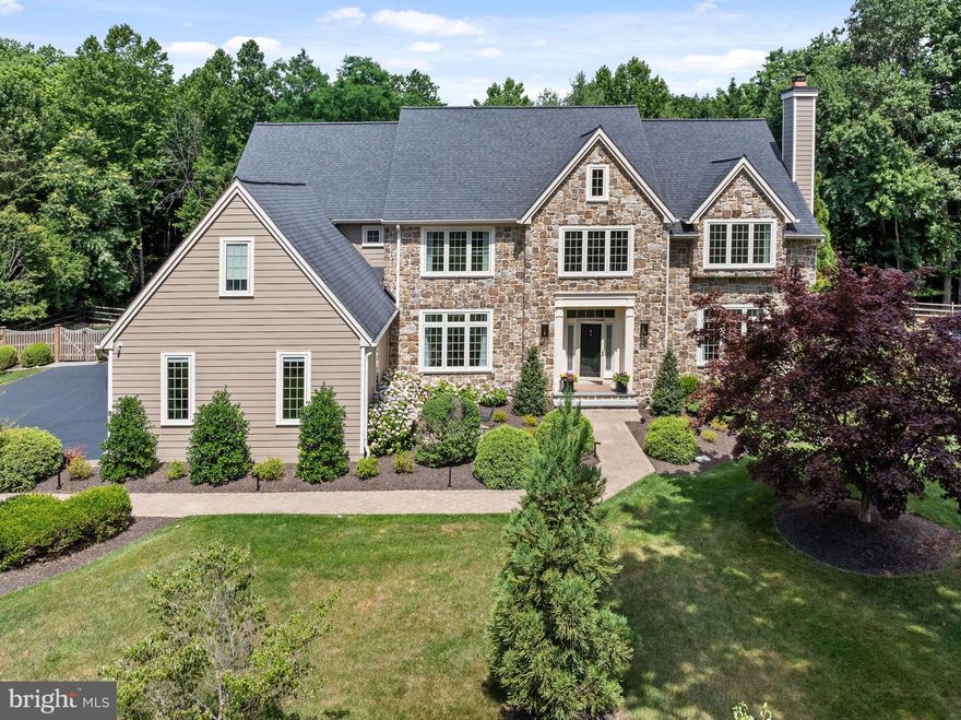 Nestled in the prestigious Treyburn community of Tredyffrin Township, the stunning property at 820 Dresher Way epitomizes luxury and sophistication, beautifully situated before the end of a quiet cul-de-sac. This location combines the benefits of serene, private living with the convenience of a close-knit community atmosphere. The home  itself, owned by the original owner since its construction, has been meticulously maintained, loved, and updated, reflecting a commitment to quality and comfort. Upon entering, guests are greeted by an impressive Foyer showcasing exceptional millwork, soaring ceilings, and a sweeping butterfly staircase, setting the stage for the home's refined aesthetic. The Foyer opens onto gleaming hardwood floors that continue throughout the First Floor, adding warmth and a seamless flow to the layout. The elaborate millwork and hardwood floors together create an air of distinguished craftsmanship and timeless beauty. Adjacent to the grand Foyer, the formal Living and Dining Rooms are the epitome of elegance, perfect for hosting gatherings with fine moldings and abundant natural light that enhances the ambiance. Also on the First Floor is a private Office, both functional and stylish, featuring handsome built-ins that provide ample storage and display options, ideal for a quiet study or conducting business. Just beyond the formal spaces, the home reveals its true centerpiece: a brand new gourmet Kitchen. This culinary haven is equipped with top-of-the-line appliances, custom cabinetry, and sleek quartzite countertops. Designed for both serious chefs and family gatherings, it opens seamlessly into a stunning two-story Family Room. This expansive area is notably enhanced by striking arched beams across the ceiling, adding architectural interest and a touch of  elegance. Large windows in the Family Room illuminate the space with natural light and offer captivating views of the lush backyard oasis. Conveniently located between the formal and informal living spaces, an elegant Powder Room adds a touch of sophistication and convenience, serving both guests and family members with style and accessibility. Additionally, the First Floor includes a Laundry Room and a Mudroom, which provides practical daily conveniences and easy access to the Three-Car Attached Garage. Upstairs, the Primary  Suite provides a luxurious retreat, complete with a spa-like marble  Bathroom, Sitting Room, and a spacious walk-in closet. Continuing on this floor, there are three additional Bedrooms, each freshly carpeted with new, plush carpeting that adds warmth and comfort underfoot. One of these is an en suite with a newly installed Bathroom, offering privacy and modern comforts. The other two Bedrooms are equally well-appointed and share access to a brand new, beautifully designed Hall Bathroom. The Lower Level of this home extends the living space with natural daylight enriching a versatile area that includes a movie viewing room and a convenient powder room, perfect for entertainment and relaxation. Outside, the property features a magnificent Pool and a charming Gazebo, making it a perfect setting for relaxation or entertainment. The meticulously designed Deck and Patio are  ideal for al fresco dining and enjoying the serene surroundings. With its combination of privacy, security, and accessibility to local amenities, 820 Dresher Road is an exceptional choice for those seeking a tranquil yet convenient lifestyle in a vibrant community. This home's enduring appeal is a testament to the loving care it has received throughout its history, making it a truly remarkable place to live. Don't miss this gem....showings begin WEDNESDAY JUNE 26th.