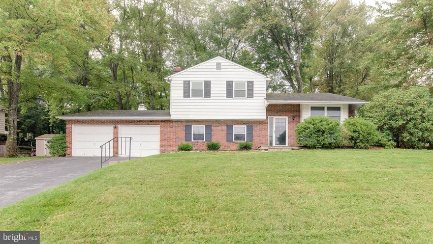Beautifully updated home set on picturesque lot in popular Marchwood neighborhood.  The first floor features a living room with recessed lighting and ceiling fan.  The custom kitchen is breathtaking and includes handsome wood cabinetry, spacious countertops, stainless steel appliances, farmhouse sink, island with breakfast bar and recessed/pendant lighting.  Adjoining the kitchen is a light-filled dining area with sliding doors to deck and stairs to rear yard.  Upstairs you will find the primary bedroom with ceiling fan, two additional bedrooms with ceiling fans and remodeled hall bathroom with double sink vanity.  The lower level features a fireside family room, laundry area and remodeled powder room.  A two-car attached garage with inside access, wonderfully landscaped grounds and the outstanding Downingtown School District, are but a few more features this pristine home has to offer.  Truly move-in ready.  Schedule an appointment to see today!