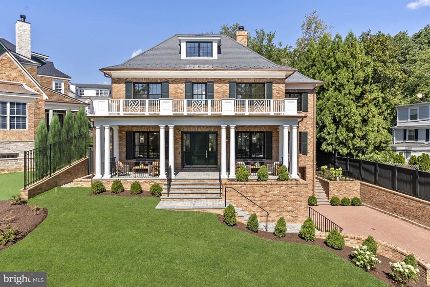 Sited on a manicured 0.20-acre parcel in prime Spring Valley, 3901 52nd St NW debuts the pinnacle of ageless design and luxurious living in a coveted, suburban-like setting. Built by Galal Development in collaboration with GTM Architects, this newly constructed 7 Bedroom, 6 Full Bathroom, 2 Half Bathroom home boasts incredible scale, high ceilings, exquisite craftsmanship, custom finishes and designer fixtures throughout 8,400 total square feet and 4 exceptionally appointed levels. An elevator services all levels for maximum convenience while breathtaking dining patios, porches, and decks offer effortless indoor/outdoor living. The main level’s expansive entertaining spaces with 10’ ceilings and white oak hardwood floors include a Gourmet Kitchen with Thermador and Wolf appliances, custom cabinetry, a large island with calacatta marble countertops, 2 sinks, and a wine cooler; adjacent Butler’s Pantry, formal Living Room with fireplace, expansive Dining Room, Breakfast Room, Office, and a spacious Family Room with fireplace leading to the walkout rear patio and garden. The ensuite Bedrooms are located on the Second Level, to include a luxurious Primary Suite. 2 Bedrooms and 1 Full Bathroom complete the 3rd Level’s offerings. The multifunctional and fully finished Lower Level with high ceilings features a large Recreation Room with a Kitchenette, an ensuite Bedroom, and an additional Half Bathroom. Lush landscaping spans the fully fenced property, lending the perfect backdrop to this magnificent residence. An oversized 2-car garage is accessed by the brick paver driveway. The home is fully integrated with Smart Home Automation including speakers, cameras, and security system. 
Sited in one of DC’s most desirable neighborhoods, residents of Spring Valley enjoy the perfect synthesis of suburban serenity and urban convenience. Just a few blocks away lies the Spring Valley Commercial Corridor including Millies, Compass Coffee, Starbucks, CVS, Crate and Barrel, and more. Spring Valley Park is close by as well as Batter Kemble and Glover Archbold Parks. Zoned for Horace Mann ES, Hardy MS, and MacArthur HS. Sidwell Friends, Maret, National Cathedral School, and more private schools are nearby.