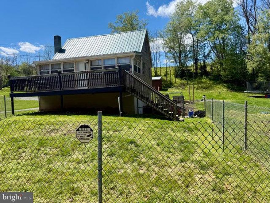 Looking for a cozy getaway or a full-time residence? Check out this home in the little community of Locust Beach (Northern Bedford SD). sitting on .424 acres, On the main floor you will find a bedroom, a full Bath, living room and a recently updated Kitchen. The upstairs offers a versatile space that could be extra sleeping area, office, etc. Stunning natural wood throughout the home. Full basement. Easy access to river frontage at Locust Beach. Great for fishing, kayaking etc.