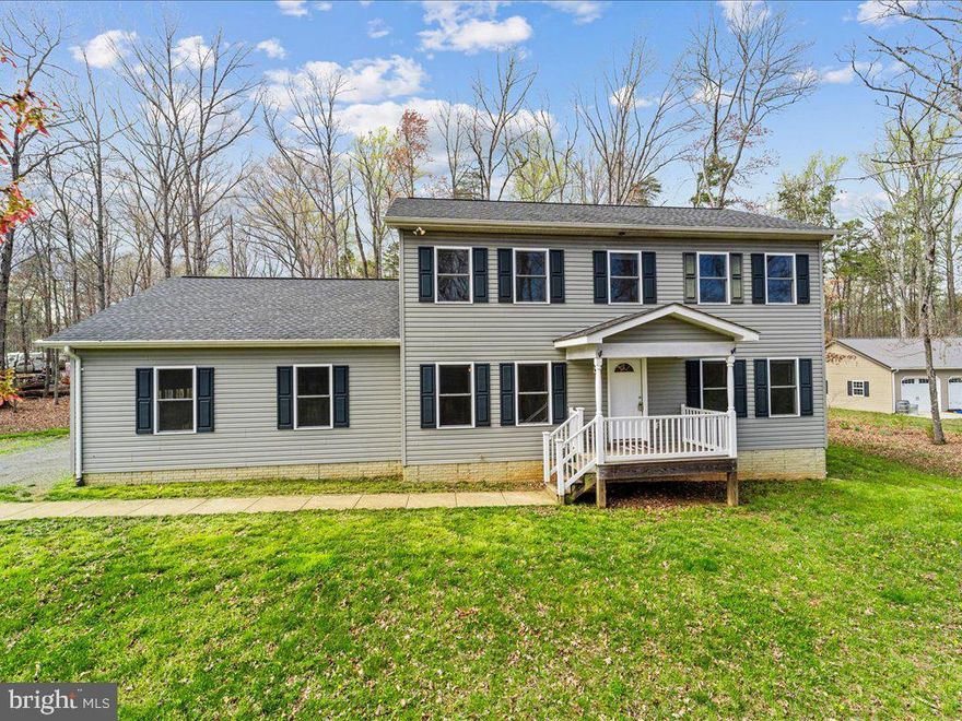 Discover easy living in this 3-bedroom, 2.5-bath colonial charmer set on over 2 acres in Bealeton. This beauty features an oversized 30x24 garage with storage cabinets and counter space for the car buffs. Space is abundant for vehicles and can easily be used as extended living space. Just add a mini-split system providing heat and a/c. The garage makes a great sanctuary for your hobbies or storage needs. The property also boasts an 18x18 storage shed, adding to the amount of space for all your outdoor tools and toys. The main level is all hardwood floors. This kitchen is a standout with its granite countertops and maple cabinets. Fresh paint throughout and new upstairs carpet make this home move-in ready. This home brings the space of country living at an easy-on-the-wallet price, making it a smart move for anyone looking to stretch out without stretching their budget.