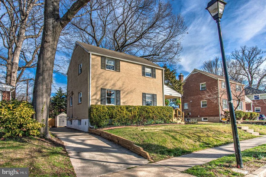 Conveniently set between the Washington, DC border and Falls Church, this handsome colonial has been tastefully updated offering a carefree lifestyle experience.  Don’t let the Arlington Blvd address fool you, there is a buffer of a service road and a tree line between this residence & the commuter route of route 50.  On approach to the front entrance of this c. 1941 all-brick house, you will admire the recently constructed front porch, with a pass-way to the rear grounds in the back.  Once inside, enjoy the recently refinished hardwoods throughout the main (and upper) level(s), with the formal living room in the front, and the dining area & updated kitchen towards the back.  Custom banquette seating with convenient storage accents the dining room. 

Upstairs on the bedroom level you will find our primary bedroom, with adjacent recently remodeled bath, a generously proportioned secondary bedroom, and a third bedroom or home-office space.  The lower level has also been updated with newer laundry appliances and another remodeled bath. 

The rear yard & rebuilt deck can be accessed from the kitchen, with off-street parking for several vehicles, a storage shed, and ample yard space.  Your new home in Arlington awaits you, this is 4727 Arlington Blvd.
