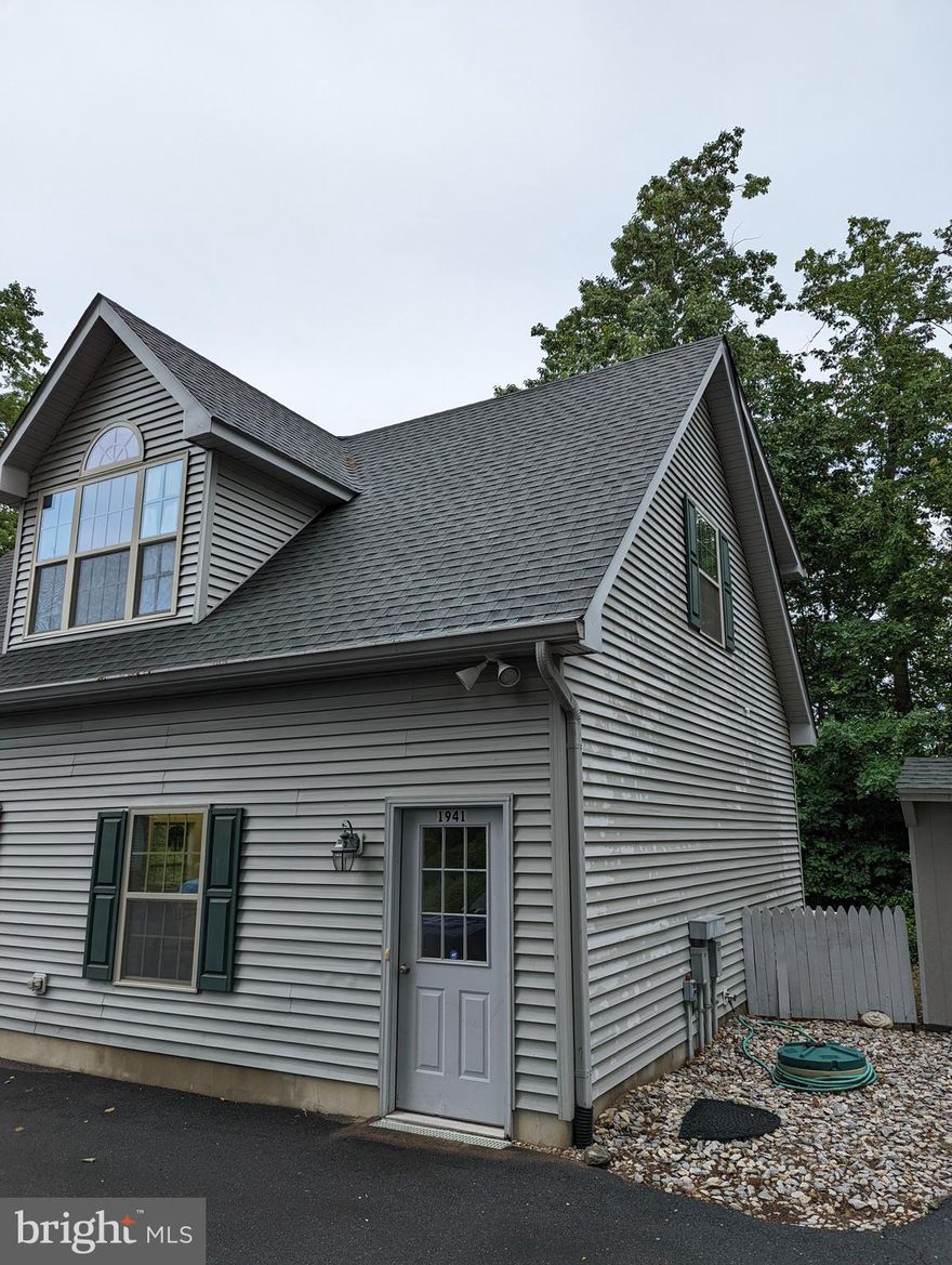 What an amazing opportunity to rent a quiet, quaint cozy cottage in an upscale community! This little gem is so warm and inviting with wonderful views. Enter through the downstairs access door and head upstairs to the unit. There is a bright open airy living room with built in's, high ceilings and huge circletop window. Just off the living room there is an ample size kitchen with all appliances and access to the laundry room which includes stakable W/D. Eating area is large enough for a table and chairs with slider access to the 2nd floor deck. Down the hall is the bedroom and full bath. This is a unique property in that it is situated above the accessory garage of the home owners residence. So there is a shared driveway but the unit has it's own designated parking space right at the entryway. There is a small storage shed included in the rent and the owner pays the water/sewer/trash so the tenant only has an electric bill. You get to enjoy views of the meticulously maintained yard and picturesque views of the wildlife and waterway of the Saint Jones river. There is a dock that can be utilized with permission of the owner if you so desire. Minutes to RTE 1 for access to points N & S and DAFB. Furniture shown in the photos will remain in the unit.