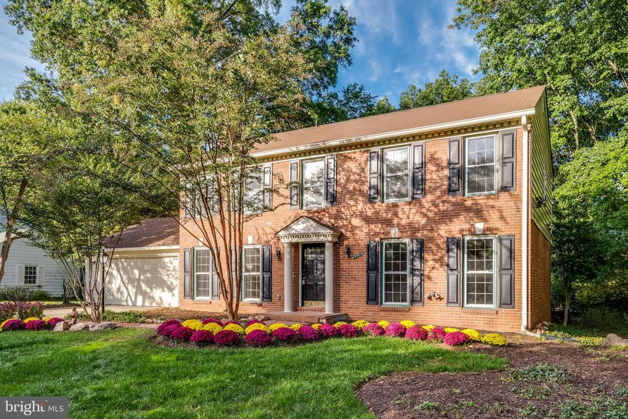 Renovated from top to bottom including the bathrooms, floor and kitchen, this lovely updated colonial is for sale in Lakevale Estates! The quarter turn staircase welcomes you into the foyer on the main floor which also features a formal living room, formal dining room, powder room,  family room with wood-burning fireplace and updated eat-in kitchen with quartz countertops and stainless steel appliances. The laundry/mud room and access to the 2-car garage are off of the kitchen. All of the bedrooms are located on the upper level including the fifth bedroom which has been converted into an oversized walk-in closet for the primary suite which also features an updated attached bath. An additional hallway bath and gleaming hardwoods complete the floor. The lower-level contains a large recreation room with new LVT flooring. Located halfway between Oakton and Vienna means that you can enjoy the best of both worlds. 1.8 miles from the Vienna Caboose, 2.2 miles from Oakton Shopping Center and 2.5 miles from the Vienna Metro means that you are close to it all. Welcome home to Lindel Lane!