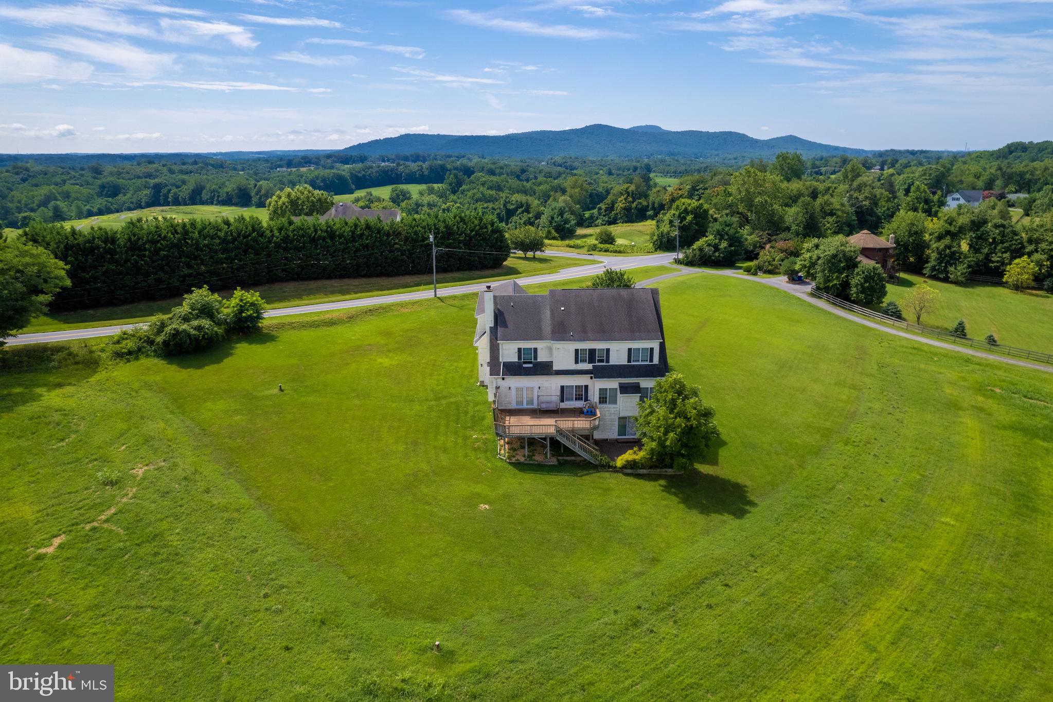 Close to Village of Urbana and live a country lifestyle with fantastic pastoral & Sugarloaf Mountain view .. The 2001 single family with 1.23 ac. provides 5 bedrooms , 3.5 bath , fireplace , large deck and 3 car garages . 5,000 + sq. ft. total finished area. Finished walk-out basement . Across from Worthington Manor Golf Club Minutes to I-270 , Rt. 355 and Village Shopping Center .