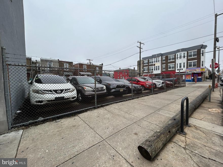 Corner 14 car parking lot
Approximately 64 feet of frontage on the west side of North 60th Street and 67 feet of frontage on the south side of Arch Street.  Total lot area 4320 square feet.  Zoned CMX-2
Highest and best use of the parcel of land would be the development of a 3 story apartment complex with 8 apartments on the top 2 floors and commercial development on the ground floor.