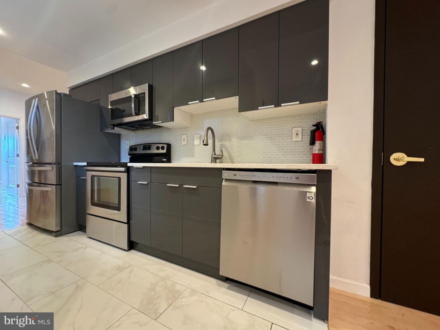 Welcome to    657 North 12th Street,  A Triplex built in 2016, this well-maintained property offers modern construction with a remaining tax abatement through the end of 2026. The 3 story home features three bedrooms and two-and-a-half bathrooms on the first floor, second and third floor features two bedroom two bathroom units, providing a functional layout for a variety of living needs. The interior includes contemporary finishes and an open floor plan designed for comfortable living. Conveniently located near local amenities, public transportation, and major roadways, the property offers both accessibility and neighborhood appeal.