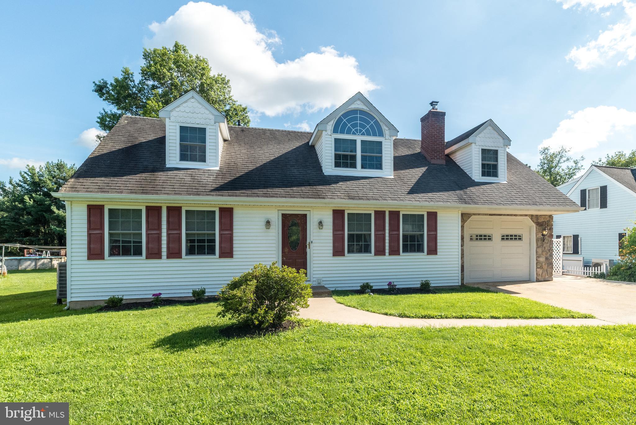 Beautifully updated expanded Cape Cod tucked on a quiet, tree-lined street yet just minutes from parks, shopping, restaurants, and the Saucon Rail Trail! This charming home offers four bedrooms—including two on the first floor with a full bath, and two upstairs, including a spacious master suite with an ensuite bath and a hall bath. Every window and door has been replaced within the past five years. You'll love the warmth of the pristine wood floors throughout, a cozy propane fireplace in the living room, and a sun-drenched family room with walls of windows overlooking the backyard.
The custom kitchen is a standout, featuring solid wood cabinetry, granite countertops, and a beautiful custom tile backsplash—features that are also echoed in the bathrooms for a cohesive, upscale look. Granite surfaces and tile continue throughout the home, including the bathrooms, laundry room, and even the window sills. The partially finished basement adds extra living space, complete with a pellet stove for cozy comfort.
Brimming with charm, quality finishes, and thoughtful upgrades, this home offers the perfect blend of comfort, character, and convenience.