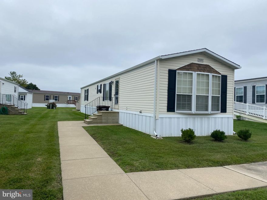 Lovely manufactured home for sale in the Southside Landing Community in Dorchester County. Quick access to routes 16 and 50 for travel to the beach or the bay.  Main living area has a cozy fireplace. Kitchen is open to the living area for entertaining. 2 bedrooms, 2 baths. Soaking tub in the primary en suite bathroom. All appliances included.

Buyer must have proof of funds prior to submitting an offer. Buyer will need to be approved by community manager (application/credit report & background check required - fee may apply). 

Buyer can call park manager to make application and obtain rules & regulations. Ground rent amount will be disclosed to Buyer at time of application by the community manager (does not include water/sewer/trash pickup).