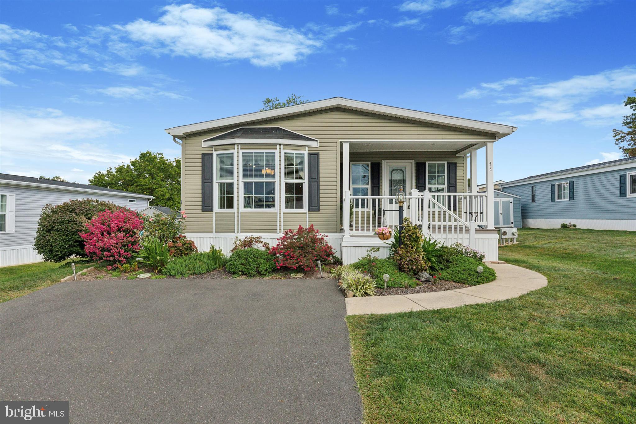 OPEN SATURDAY Sept 6th 1-4PM! Welcome to 55 & Better Living! This beautifully cared-for home in the heart of a vibrant over-55 community offers the perfect blend of comfort style and ease. Step through the decorative glass front door to find a light-filled spacious Living Room with ceiling fan/light combo, attractive crown molding, plus coat closet. Gorgeous and roomy kitchen beckons the chef with ample counter space, abundant attractive cabinetry, high hat and task lighting, built-in microwave, smooth top range, durable vinyl flooring. Sunny breakfast room boasts walk-in bay window, convenient breakfast bar. Down the hall, Laundry/Mud room with shelves, durable vinyl, access to yard. Owner's suite offers plenty of space for King bed, walk-in closet w/organizer system, ceiling fan w/light fixture. PLUS en suite Owner's Bath w/dual vanities, more cabinetry for storage, BIG stall shower with built in seat, plus makeup vanity, linen closet. Two additional roomy BR's with ceiling fans. Hall Bath features full sized shower over tub. Neutral flooring colors and crown molding throughout. NEW HVAC Summer 2025, newer hot water heater. Convenient to major shopping, restaurants, Rte 309 and Septa R5 train service. Community pool, clubhouse and activities!