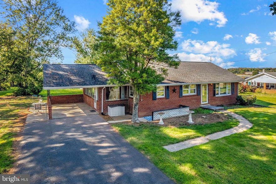 98 Cedar Ridge Road offers 3.8 acres of privacy with sweeping mountain and pastoral views. This 4-bedroom, 2.5-bath home includes an enclosed porch perfect for taking in the scenery and a convenient carport. The setting is quiet, open, and ideal for anyone looking for space and views in a country setting. Buyer is responsible for verifying all information.