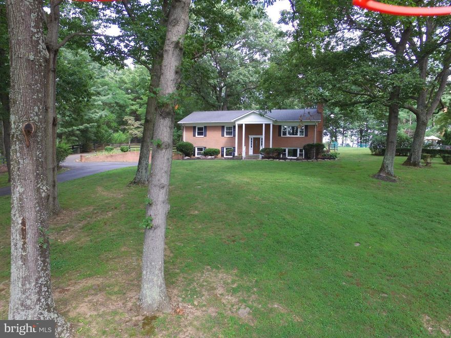 BEAUTIFUL BRICK HOME IN SERENE 3 ACRE SETTING...INGROUND SYLVAN GUNITE POOL...HOT TUB...SPECTACULAR VIEWS...STONEWALLS, FRUIT TREES, BLUEBERRIES, FIRE PIT, LARGE SHED, MATURE TREES & PLENTY OF ROOM TO RELAX OR PLAY...NEWER WINDOWS+ROOF+STAINLESS APPLIANCES...WOOD FLOORS...UPDATED BATHS...WOOD BURNING FP + PELLET STOVE...GREAT SUNROOM + SCREENED PORCH...XTRA LARGE 1CAR GAR + HUGE PARKING AREA..FIOS