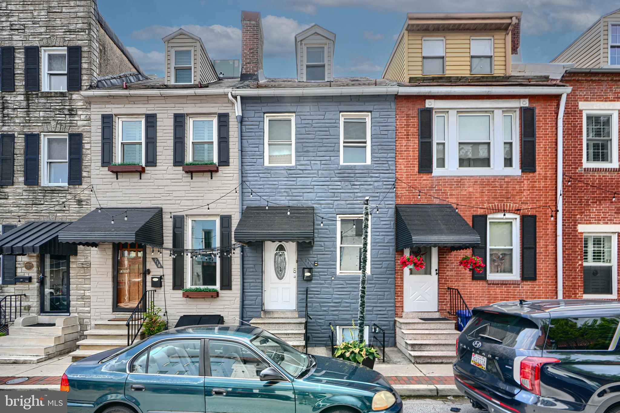 Excellent investment opportunity in Baltimore’s vibrant downtown! This 3-bedroom, 2-bath home features a finished basement, in-unit washer/dryer, and low-maintenance finishes. The kitchen is outfitted with brown shaker cabinets, granite countertops, tile flooring, and appliances, while the living area offers durable LVT and bedrooms feature hardwood. Heating is provided by a reliable wall convector unit. Steps from major attractions and employers, including the Reginald F. Lewis Museum, Mo’s Seafood, Picante Taco, Hyatt Place, Homewood Suites, Baltimore Marriott, and Metro Show Tower.