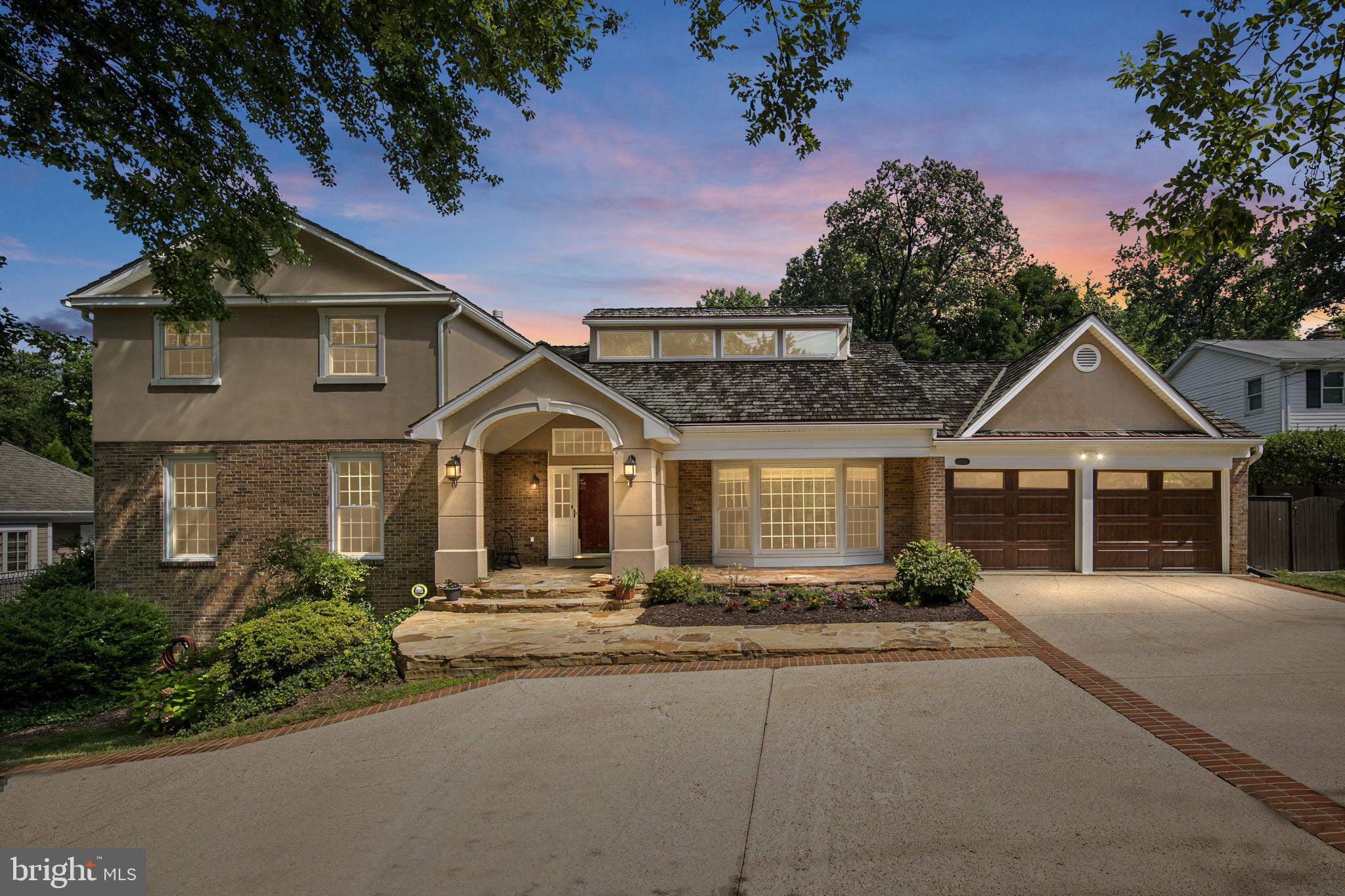 3-D Virtual Tour Available -- https://my.matterport.com/show/?m=9SFxzbe3nqj&brand=0&mls=1 -- Beauty. Light. Space. This voluminous 5,000+ sqft "Architectural Digest" home in the sought-after Luxmanor Community lies on 1/2 Acre of sprawling lawn and greenery. Gorgeous entryway and main level with soaring vaulted ceilings, Brazilian cherry hardwood floors, and skylights that bathe the space in an abundance of natural light. Stunning state-of-the-art gourmet kitchen with stainless steel Thermador Pro appliances, granite countertops, large center island, eat-in area, and additional breakfast bar leading to the formal dining room. Spacious sunken living room with extra-large wood burning fireplace and wet bar. Plenty of large bedrooms upstairs, including master suite with walk-in closet and luxurious master bath with large jacuzzi tub and glass-enclosed steam shower. Massive, fully finished lower level with full kitchen & separate rear entrance plus patio, perfect for an in-law suite. Enjoy the great outdoors on the large rear deck, or in the spacious private backyard. Convenient circle driveway & garage parking. Luxmanor is one of North Bethesda s premier residential areas, and offers residents plenty of space in a mature and friendly community with wooded greenery surrounding the homes in this lovely neighborhood. Stone s throw to Pike & Rose for dinner, shopping, coffee, music, movies, and the farmers market. Easy access to Rt 270, the Capital Beltway, downtown DC & Bethesda, plus the nearby White Flint Metro station (0.5 miles) make this a commuter s dream. Schools are the newly renovated Luxmanor Elementary, brand new Tilden Middle, and Walter Johnson High School, ranked the 6th best high school in all of Maryland by US News and World Report. This home has so much to love!