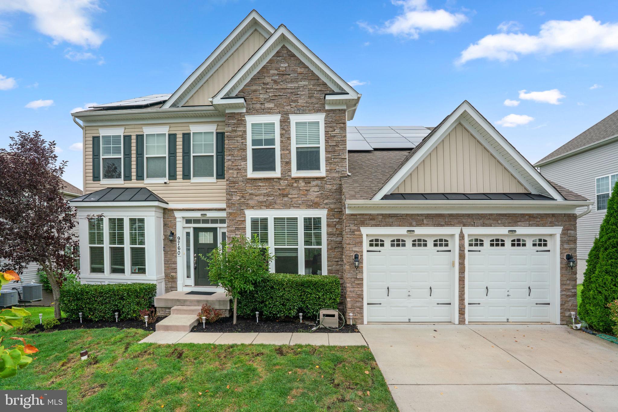 Stunning 4-bedroom home with an open-concept floor plan designed for modern living. Hardwood floors flow through most of the main level, highlighting a beautiful kitchen with a center island with seating, built-in shelving, and stainless steel appliances including a gas stove and microwave rangehood. The sun-filled breakfast room, framed by windows with bucolic views, features sliding doors that can open to the future deck of your dreams. An expansive family room with a cozy fireplace sits just off the kitchen, perfect for entertaining. Formal living and dining rooms showcase crown molding, with the dining room also accented by chair rail. A main-level home office, convenient half bath, and mudroom/laundry area with built-in shelving connecting to the 2-car garage add to the functionality. Tall 9-foot ceilings throughout the rooms and hallways enhance the spacious feel of the home.
Upstairs, the hallway bath with double sink vanity serves three bedrooms, while the expansive owner’s suite offers a huge closet and a luxurious ensuite with dual vanities, soaking tub, and separate shower.
The walkout basement with convenient access to the backyard is filled with natural light, featuring four full-sized egress windows with scenic views and two sliding doors opening directly to the outdoors at ground level. While not yet finished, the basement is rough-in ready with electric, plumbing, and framing in place, and much of the material needed for completion already available—allowing buyers the opportunity to finish it to their own tastes. It provides endless possibilities for additional living space.
Additional features include a fully owned solar system, installed in 2025, with a capacity of 13.44 kW and an annual guaranteed production of over 15,000 kWh (approximately 15 megawatt-hours). The system provides more than enough energy to cover the needs of a large family and includes surplus to power an EV—at no cost—using the installed 48-Amp EV charger in the garage. A powerwall in the garage provides additional storage for extra energy. A built-in fire sprinkler system and many other thoughtful upgrades add peace of mind and value.
Ideally located less than a quarter mile from shopping, dining, and parks, and under 30 minutes to downtown Baltimore, this home perfectly combines convenience, energy efficiency, and modern comfort. Mortgage savings may be available for buyers of this listing.