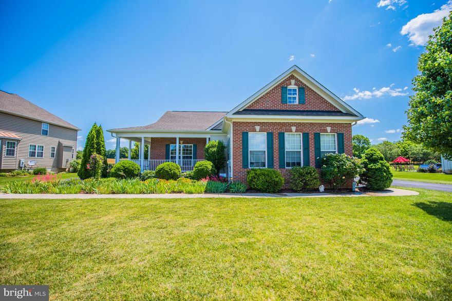 HOME SHOWS BETTER THAN NEW!! Owner paid $309,950 When Built in 2007 and Added $70,000 in Upgrades since buying the Property. Featuring Four Bedrooms / Three Baths / Eat In kitchen / Large Master Suite with Two Walk In Closets. The Basement is Finished into In-Law Suite with Kitchen and Full Bath. Covered Front, Side and Back Porches. Extensive Landscaping, Backing to Open Farm Land. And More......